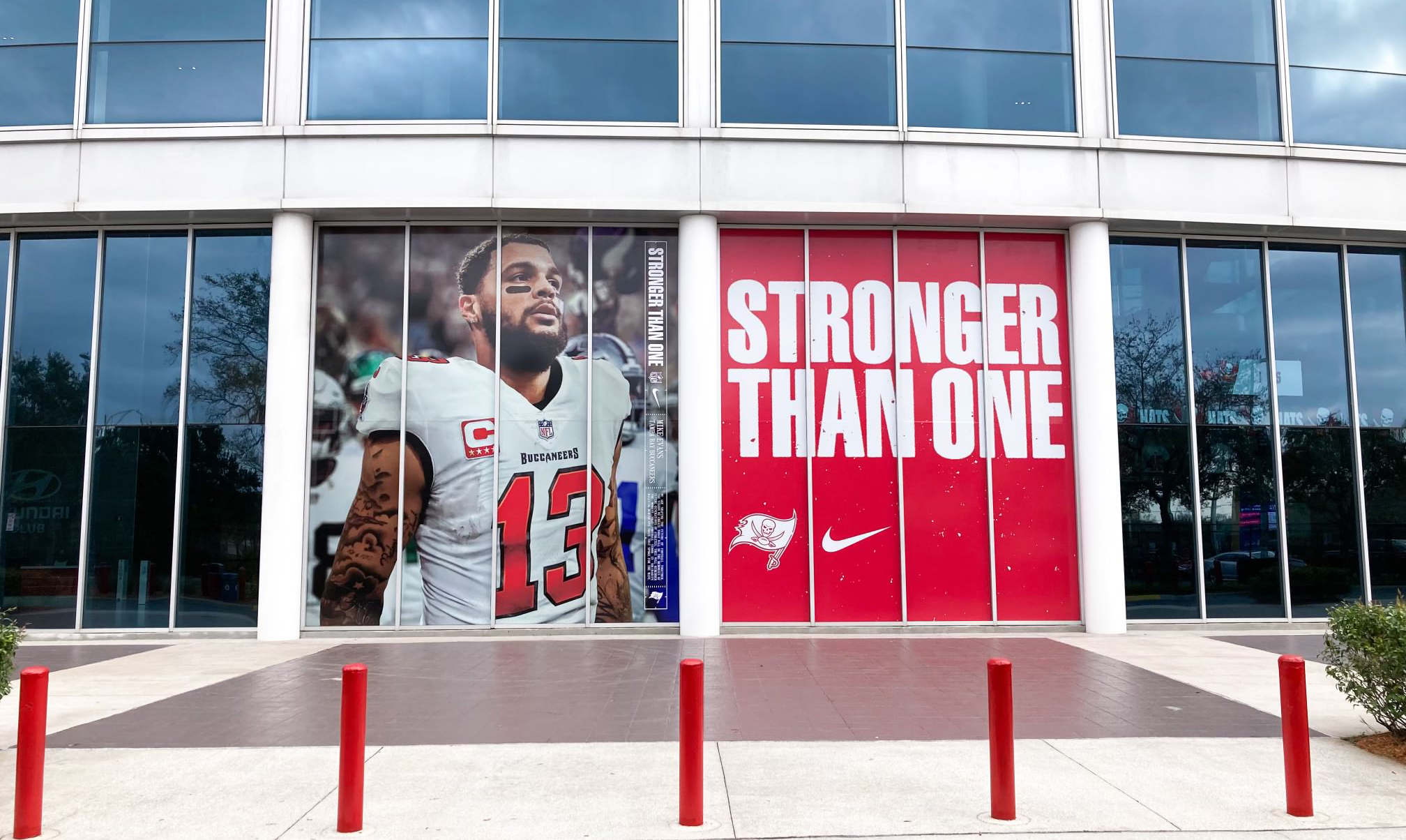 window film that says strong than one with football player